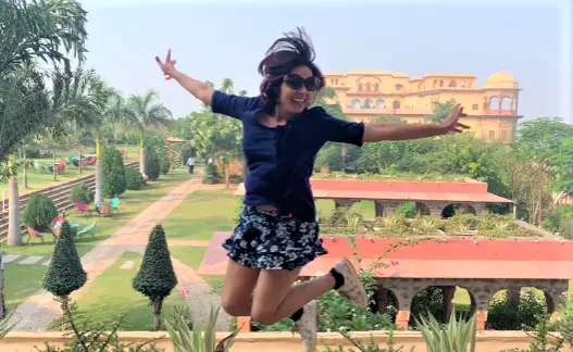 Happy Jump on Hawa Mahalwith Rani Mahal as the backdrop