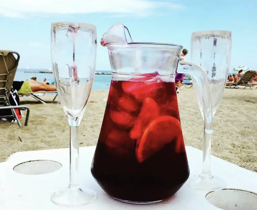 Enjoying Spanish Sangria on Barcelona beach