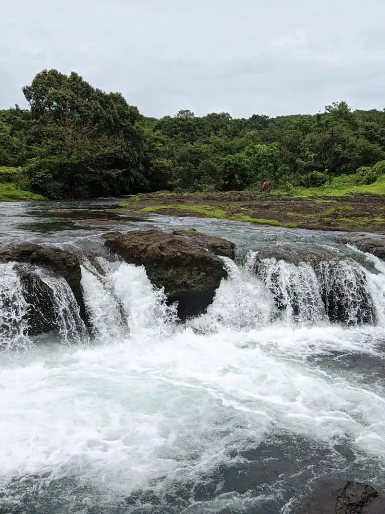 Small waterfall at shreeMahakali temple, Adivare