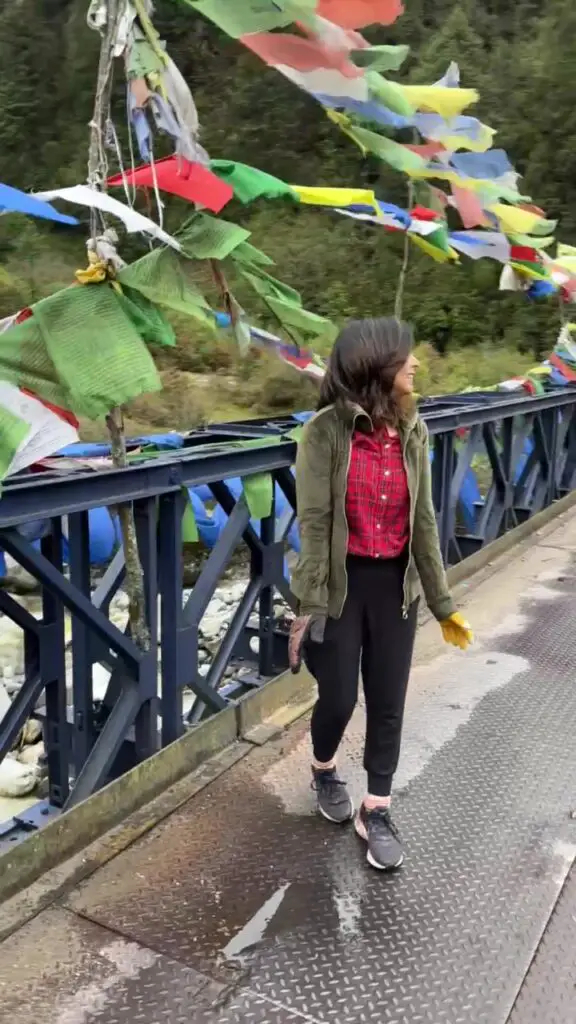 Posing at one of the numerous bridges in Sikkim